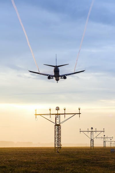 Aircraft ascending during sunset