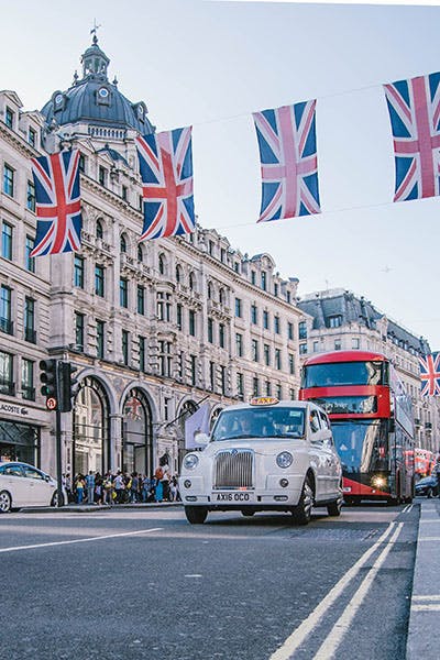Picture of a London cab and bus in Oxford Street