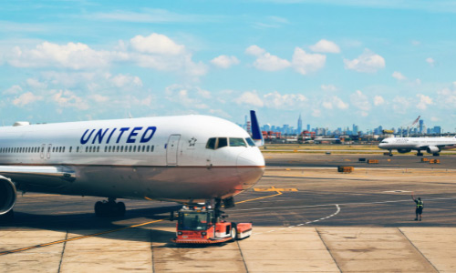 View of aircraft lined up at an airport