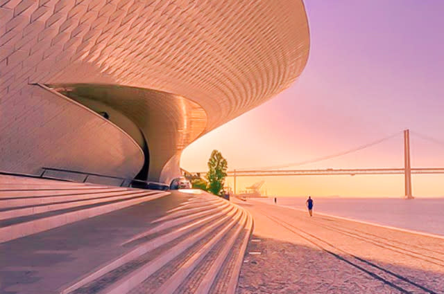 MAAT museum bathed in a warm glow from the setting sun