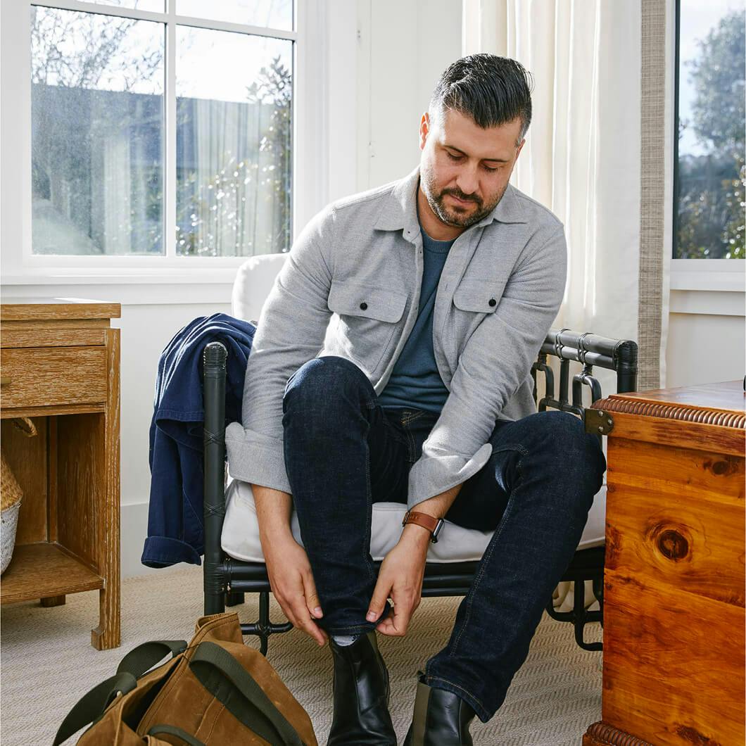 Photo of an Alto patient putting on his shoes