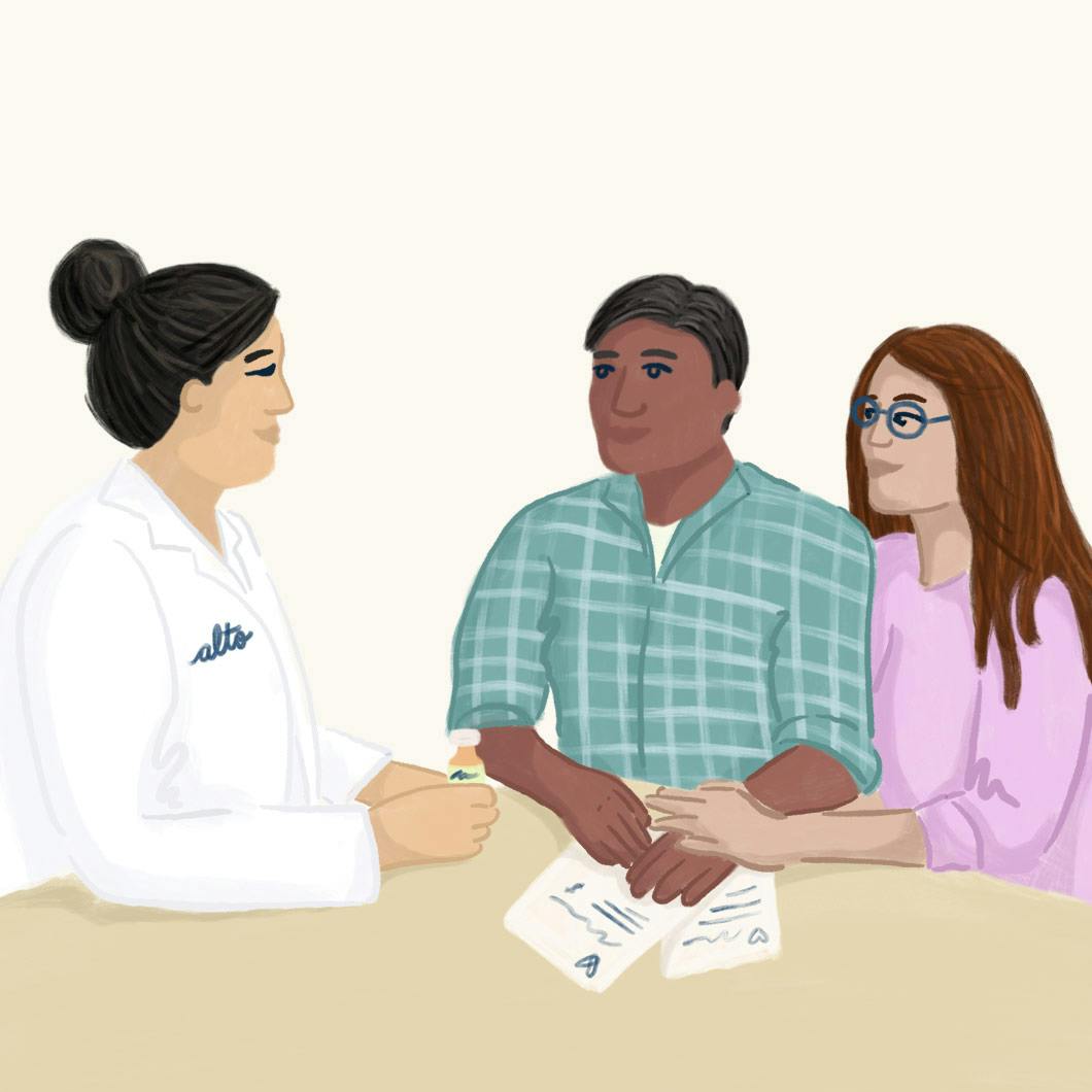 Pharmacist providing a consult to a couple