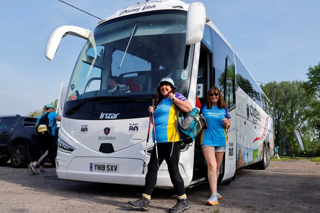 Trekkers stepping off shuttle bus