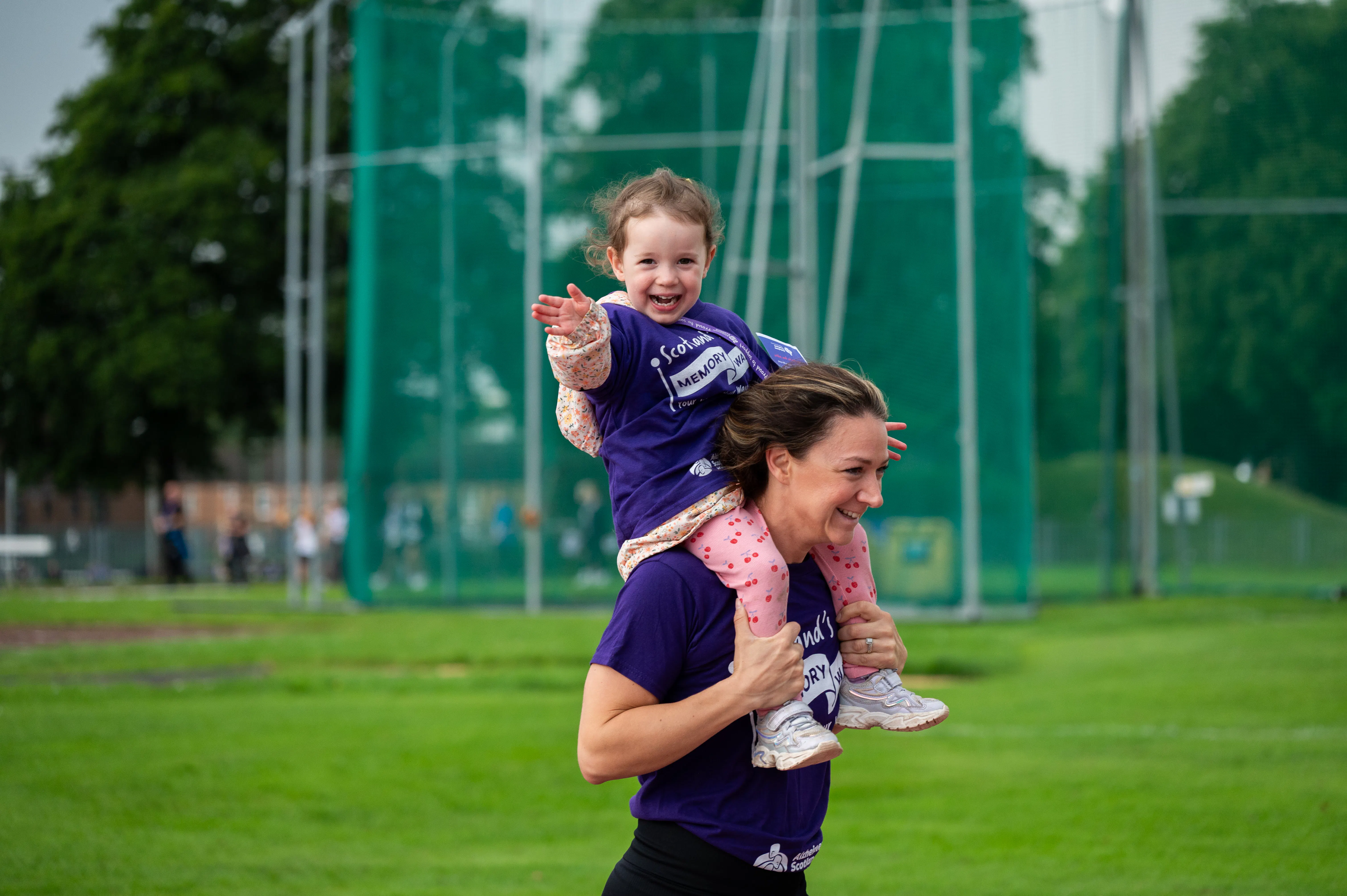 Little girl and mum taking on Memory Walk