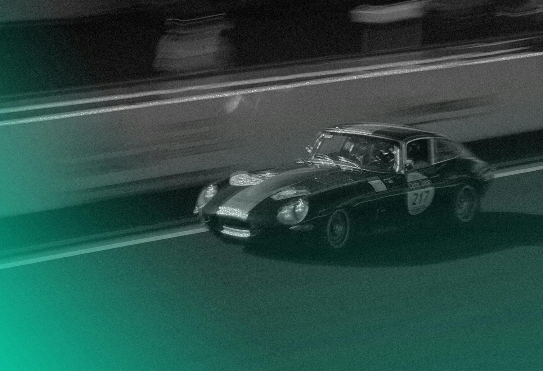 Vintage car on race with green gradient