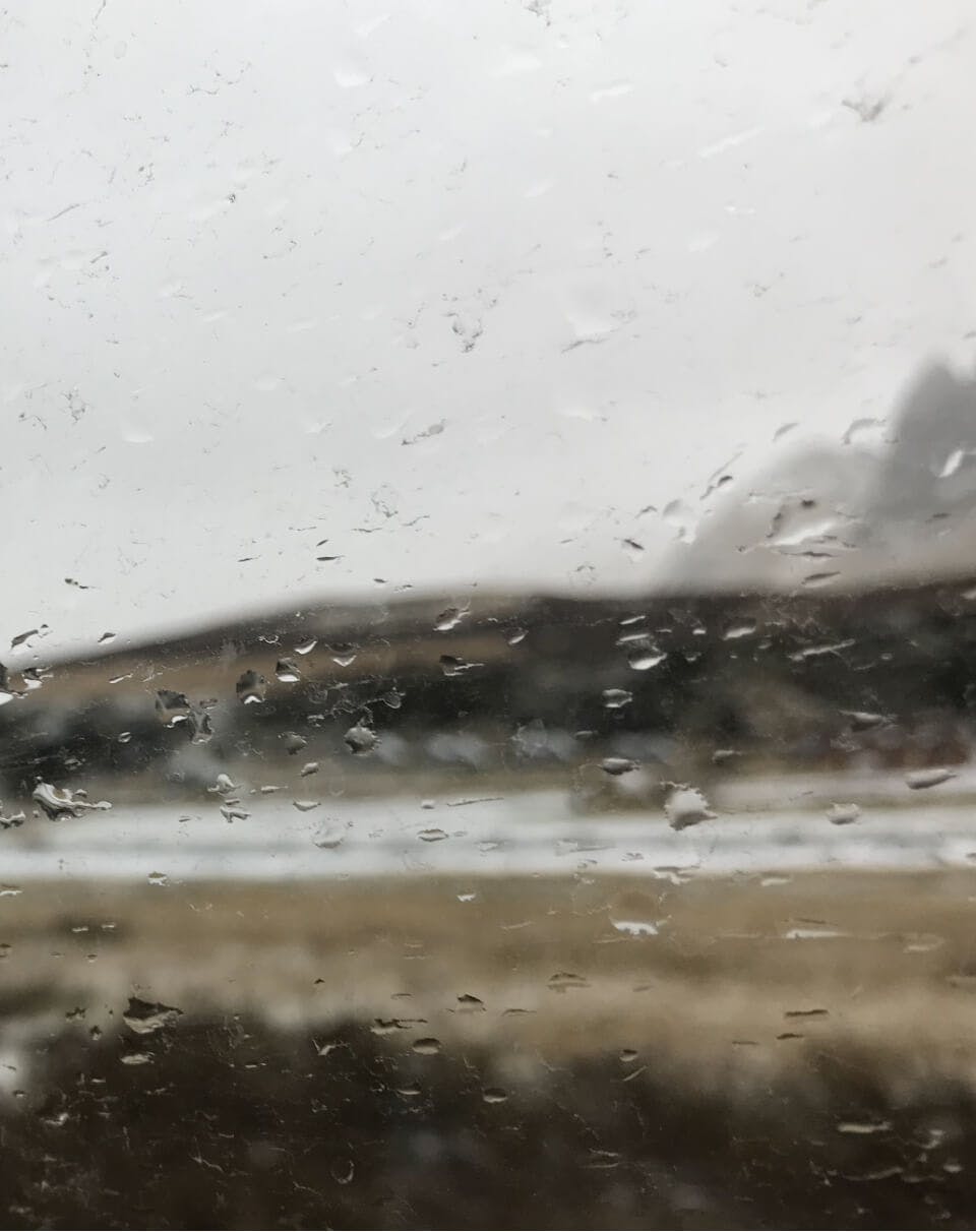 Rain on carglass with landscape