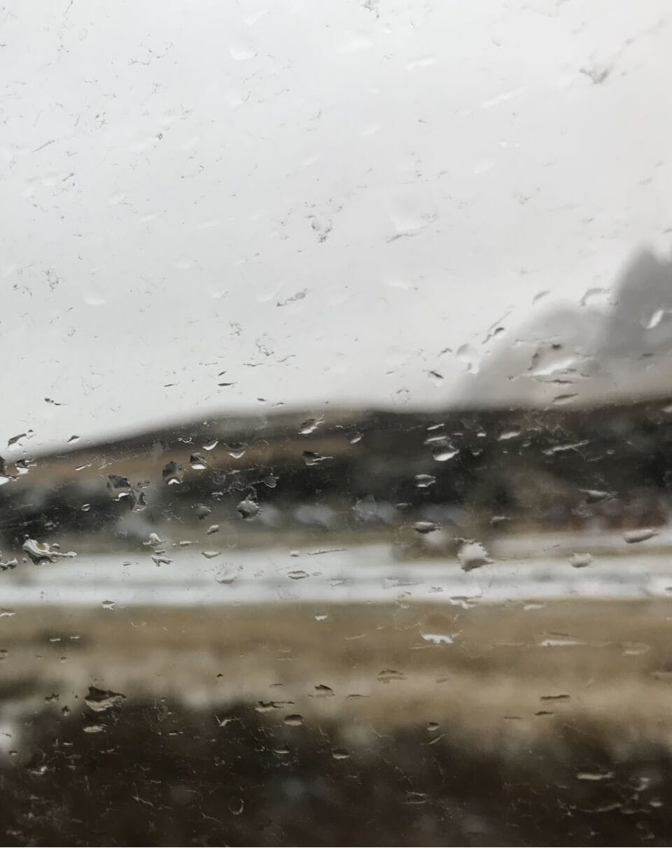 Rain on carglass with landscape