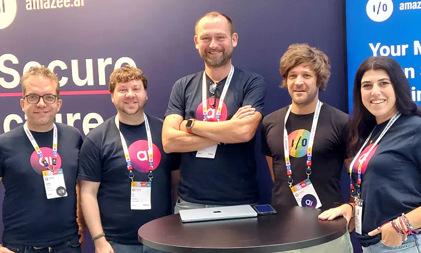 amazee.io team members and speakers assemble at DrupalCon Europe in Rotterdam at the amazee.io booth.