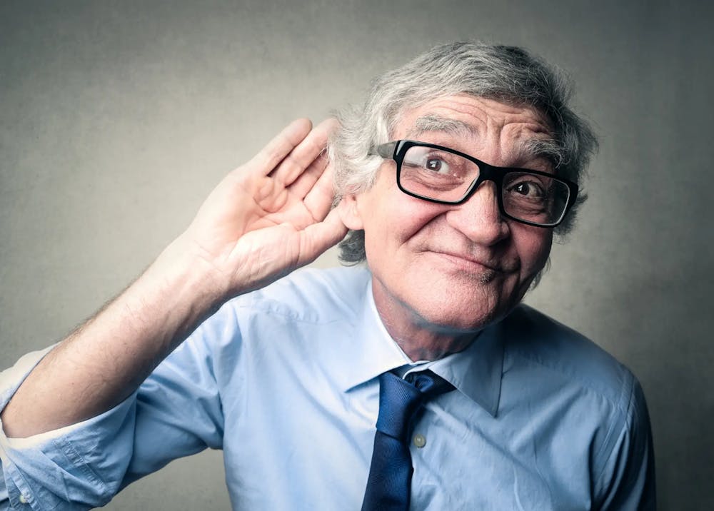 Elderly man hard of hearing in one ear