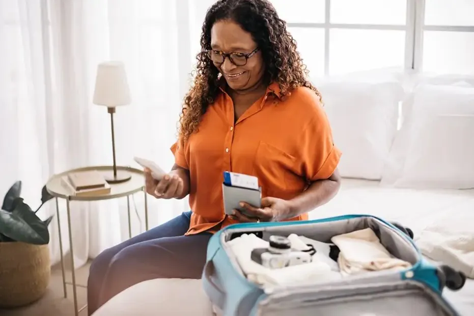 Woman packing for her trip in Lely, Marco Island and East Naples FL