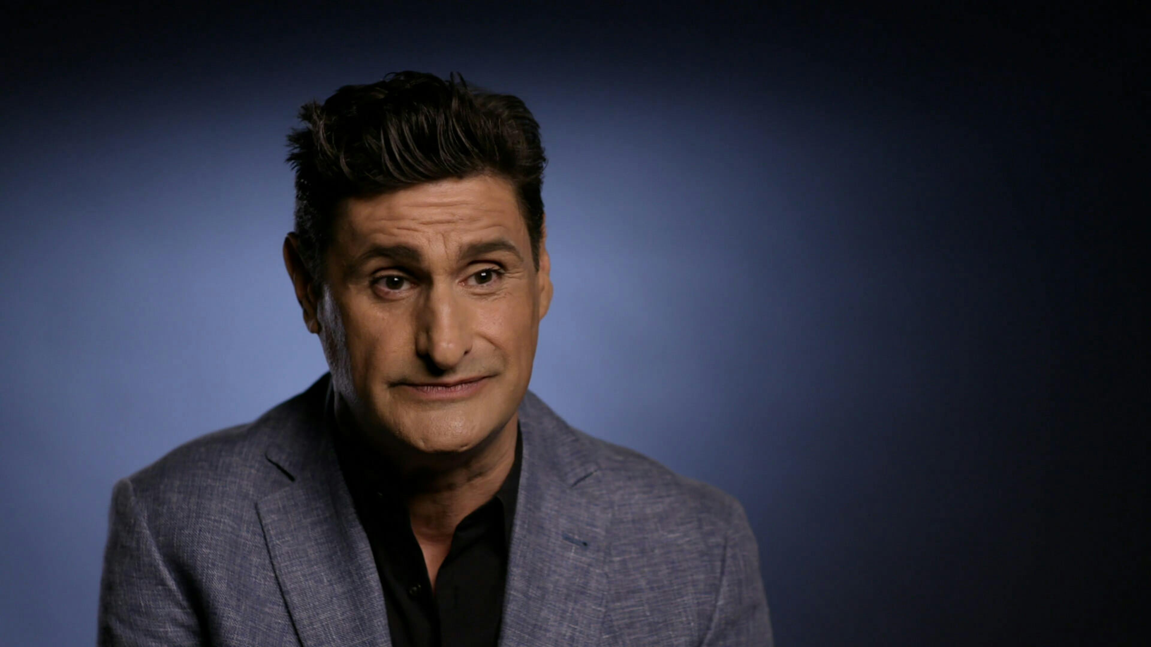 Man being interviewd