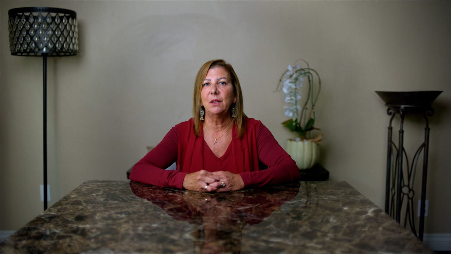 Woman talking to camera during interview