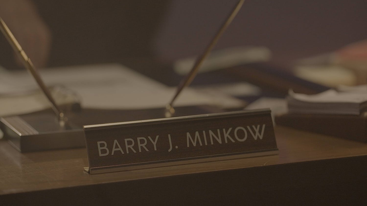 Name plaque reading 'Barry J Minkow'