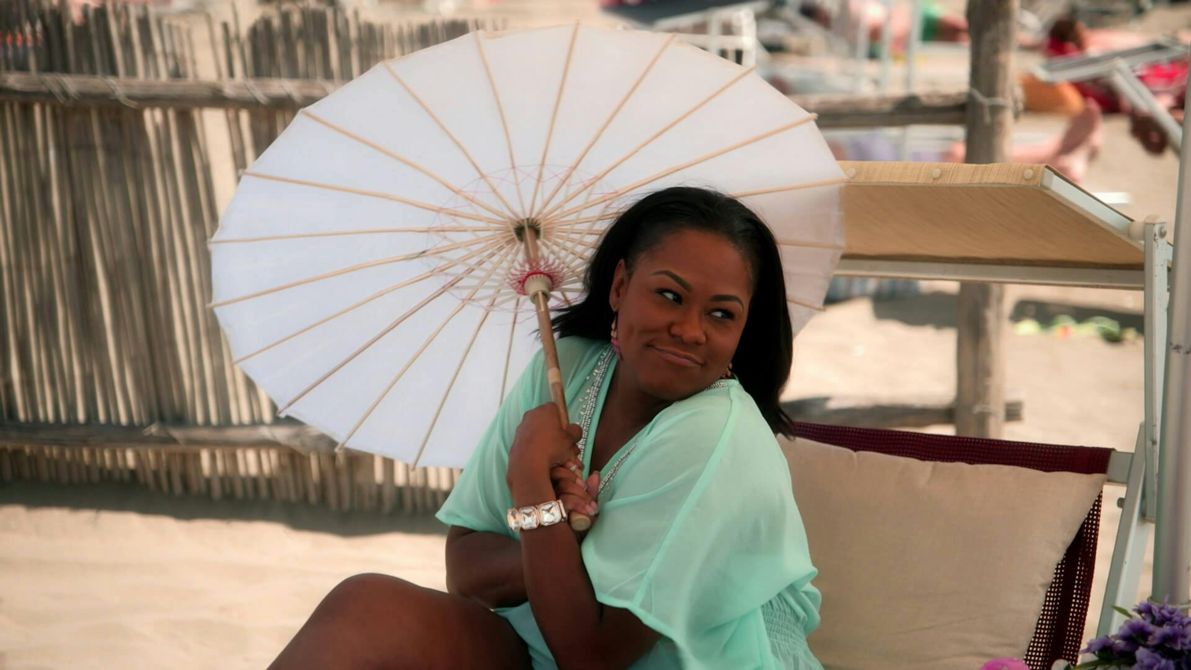 Woman holding a sun umbrella 