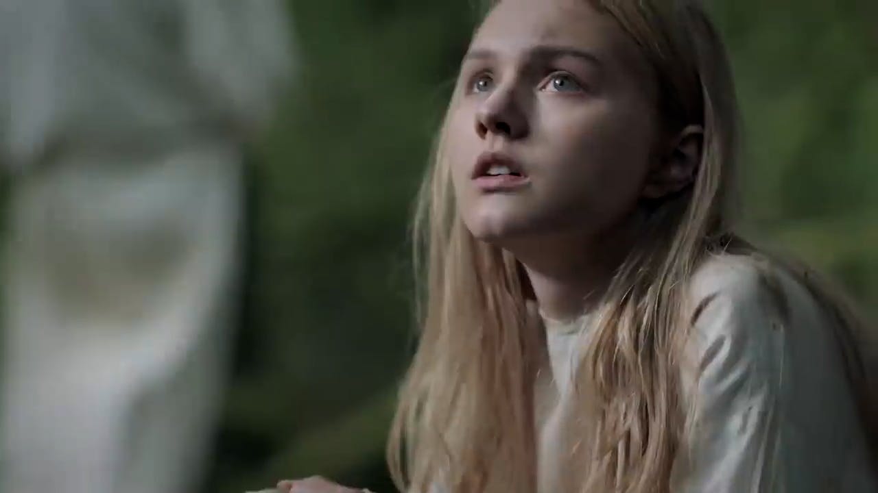 Girl looking up at someone