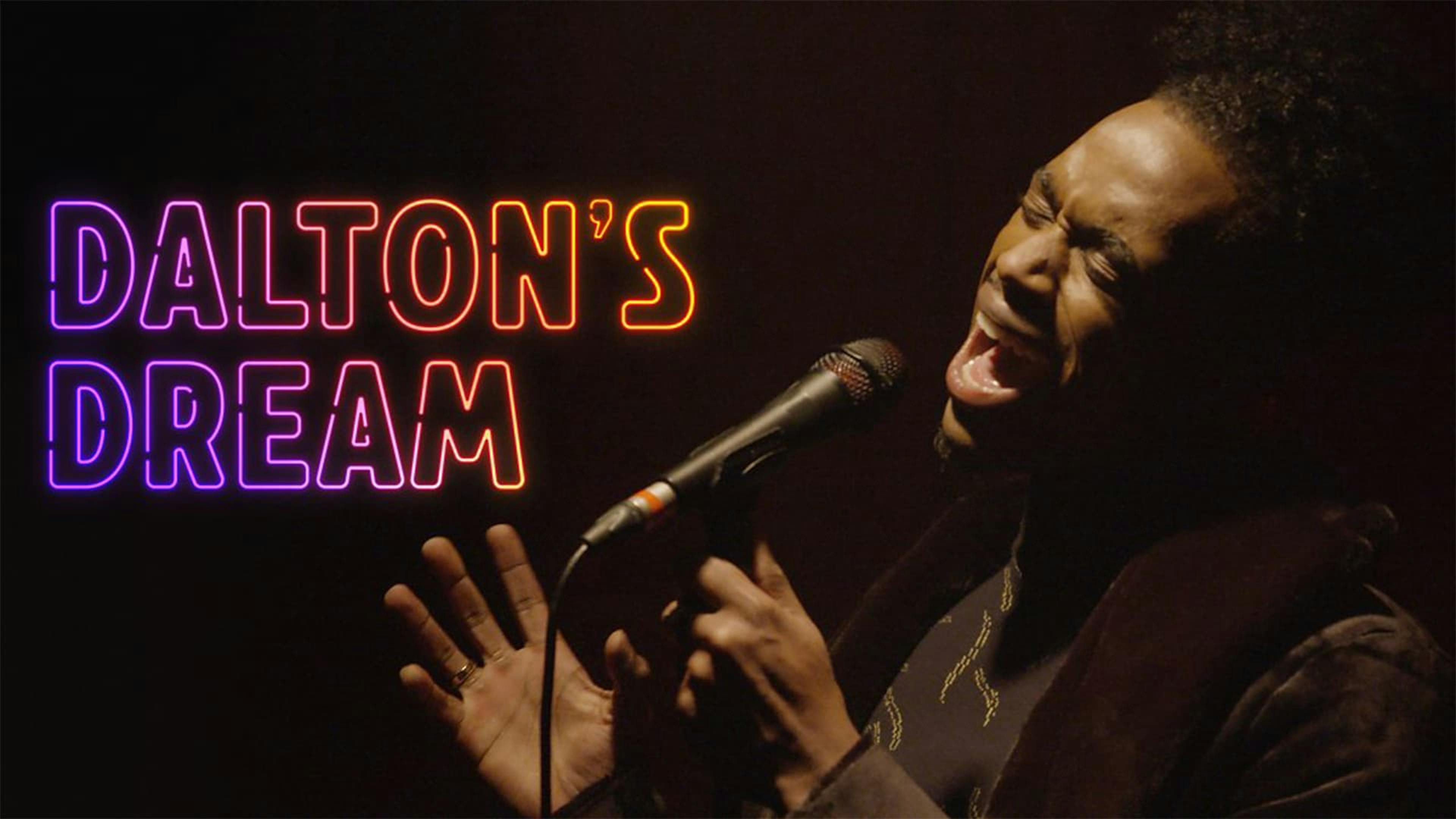 Man singing through microphone