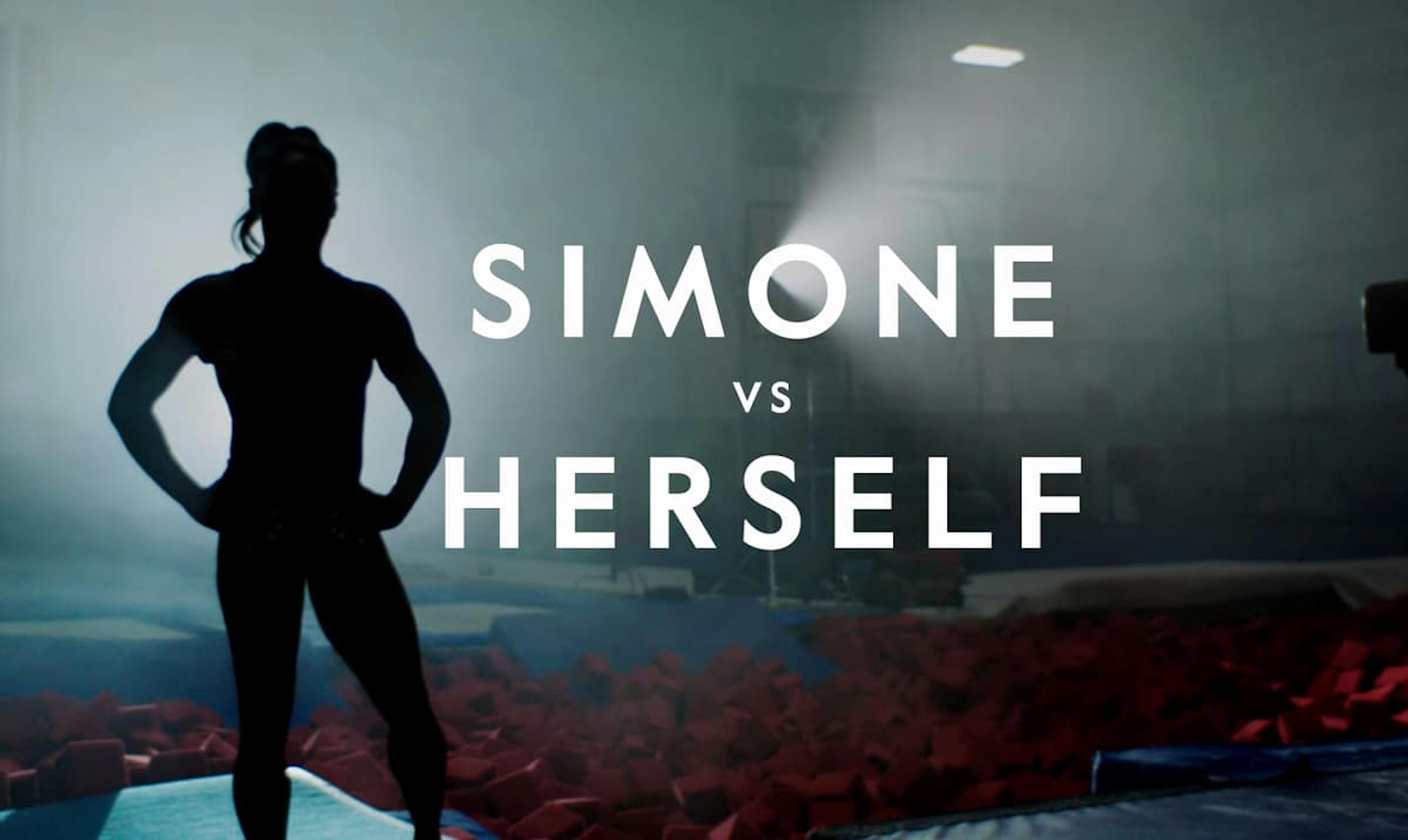 Gymnast stood in dim light