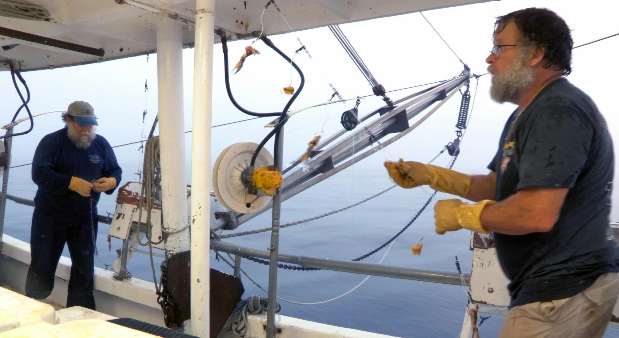 Two men on fishing boat