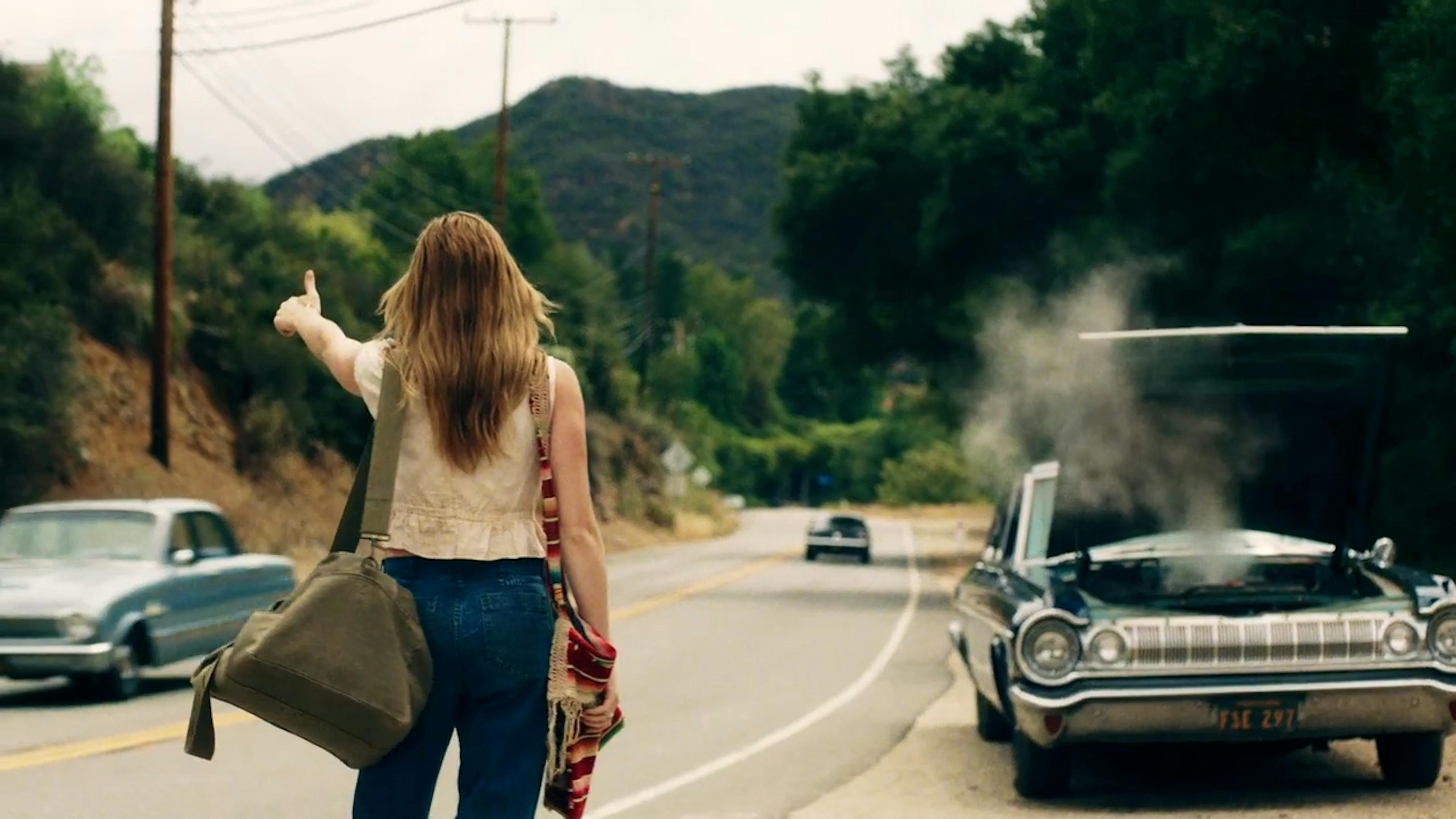 Girl flagging down car