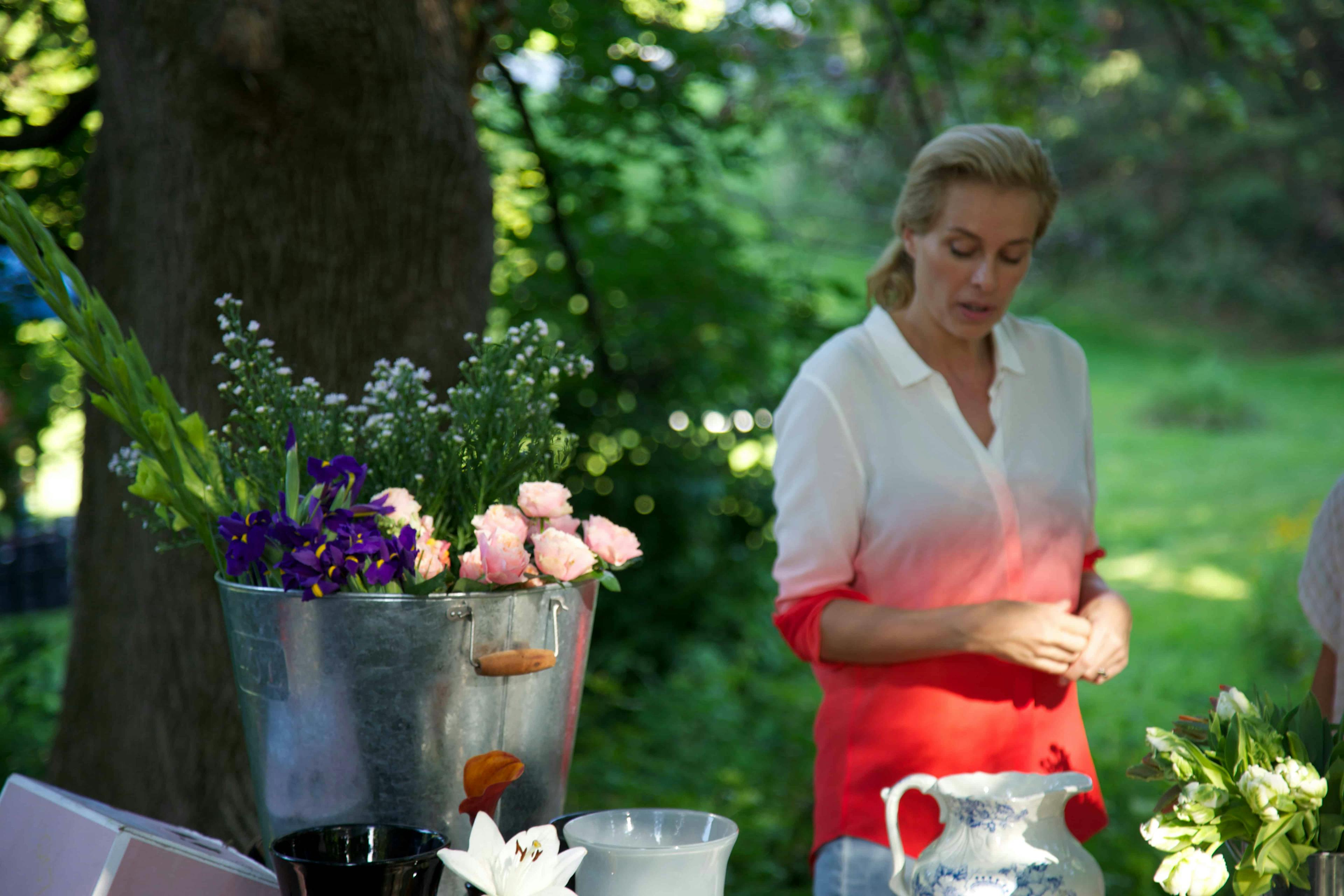 Woman looking at flowers