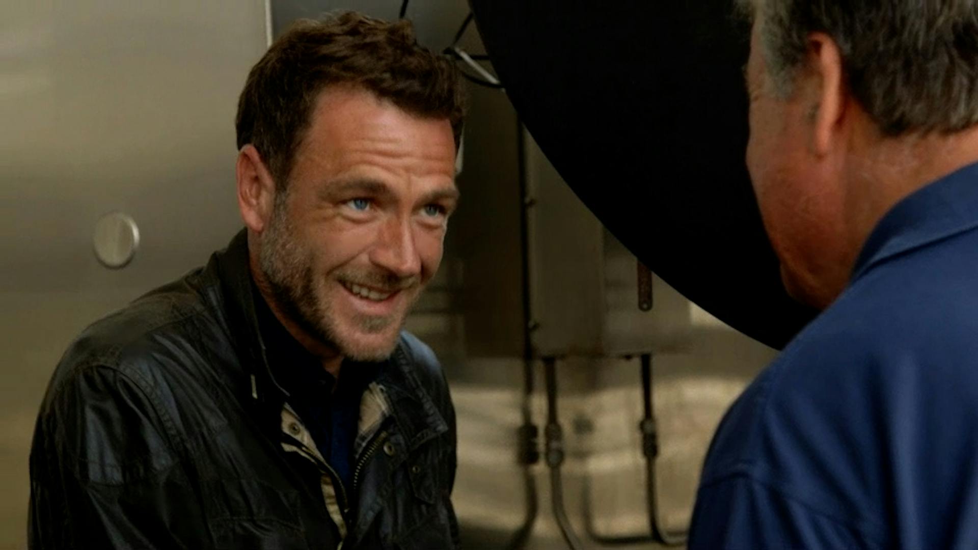 Man looking at man smiling