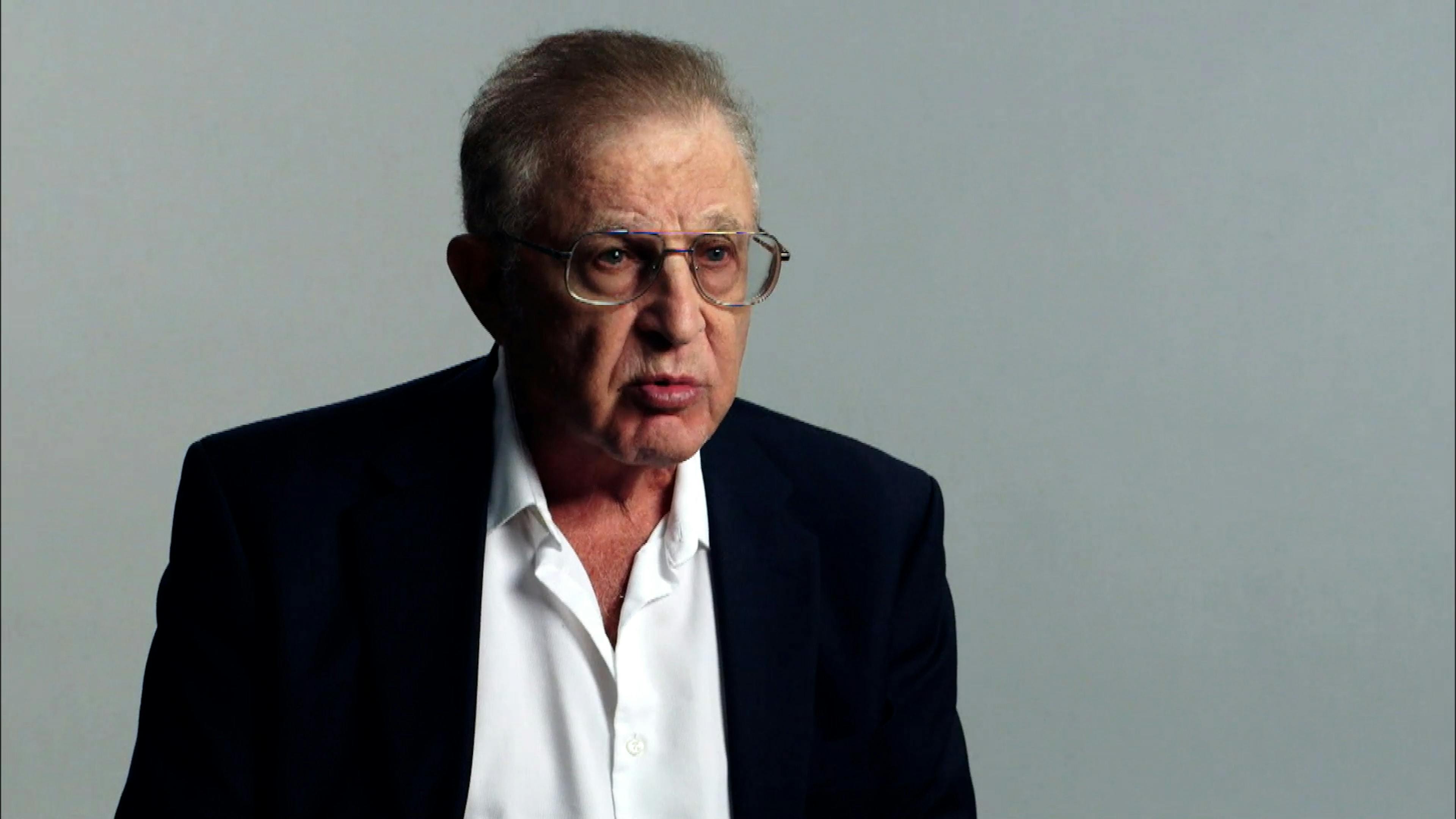 Man being interviewed