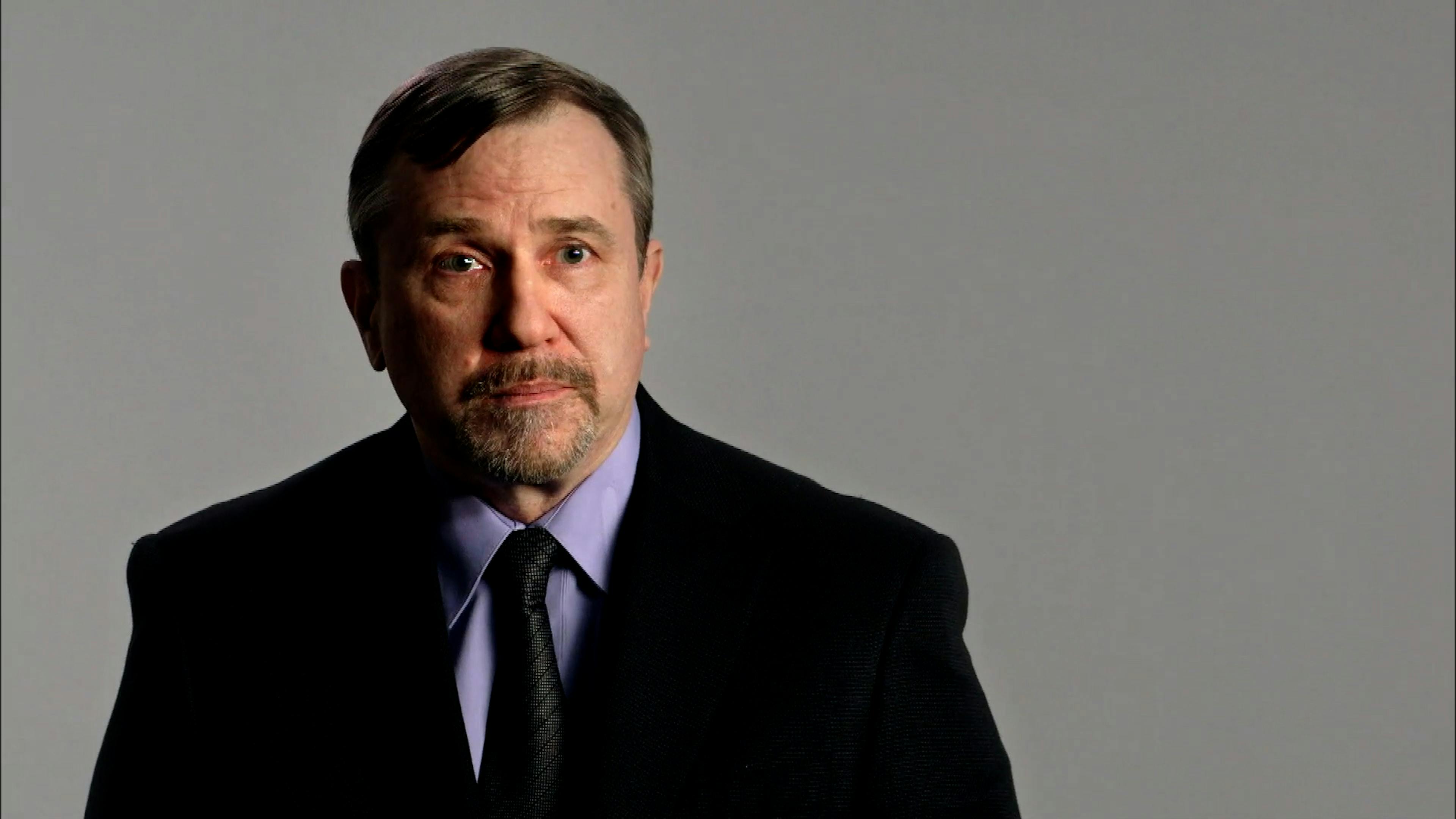 Man being interviewed