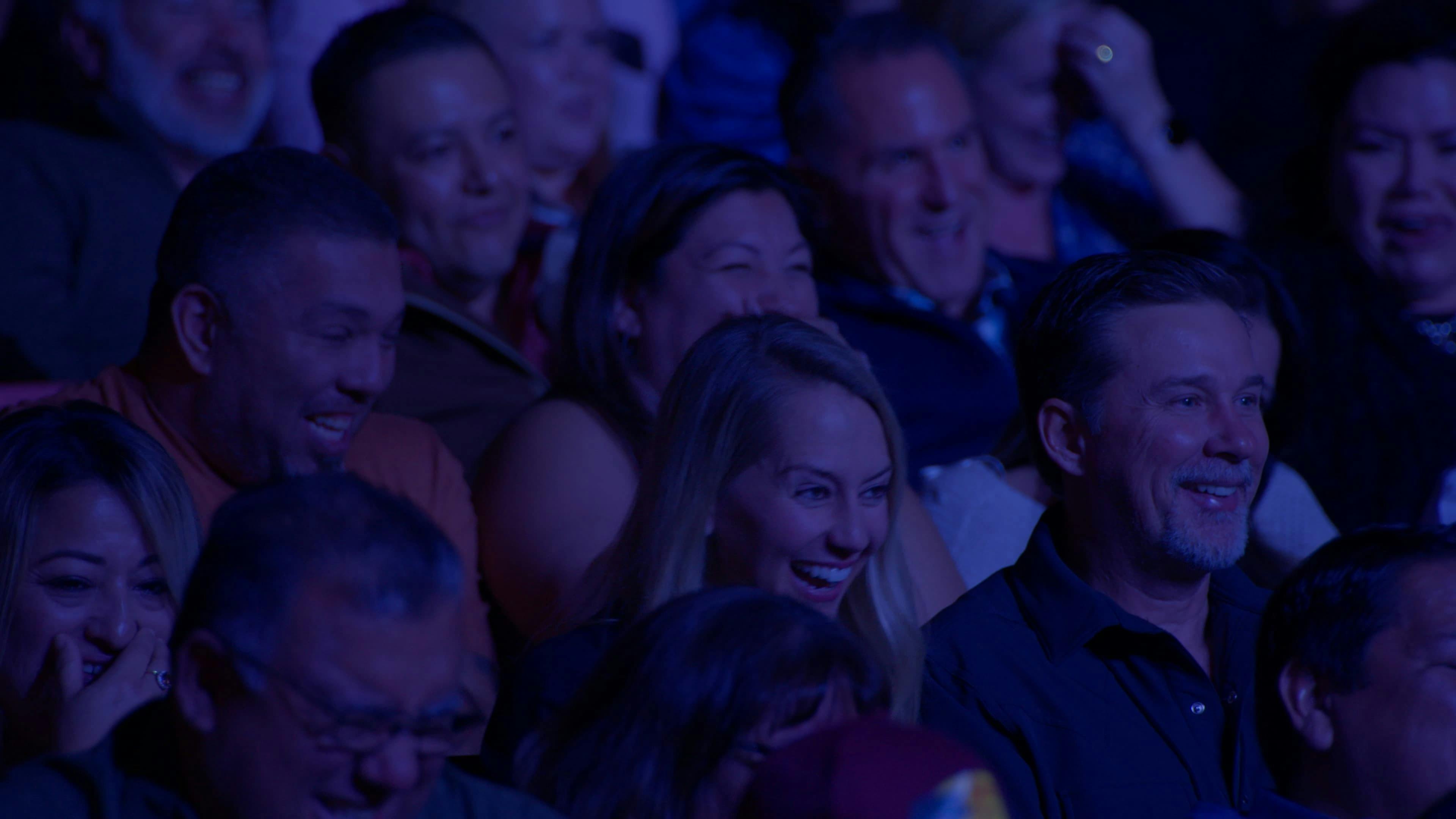 Audience laughing