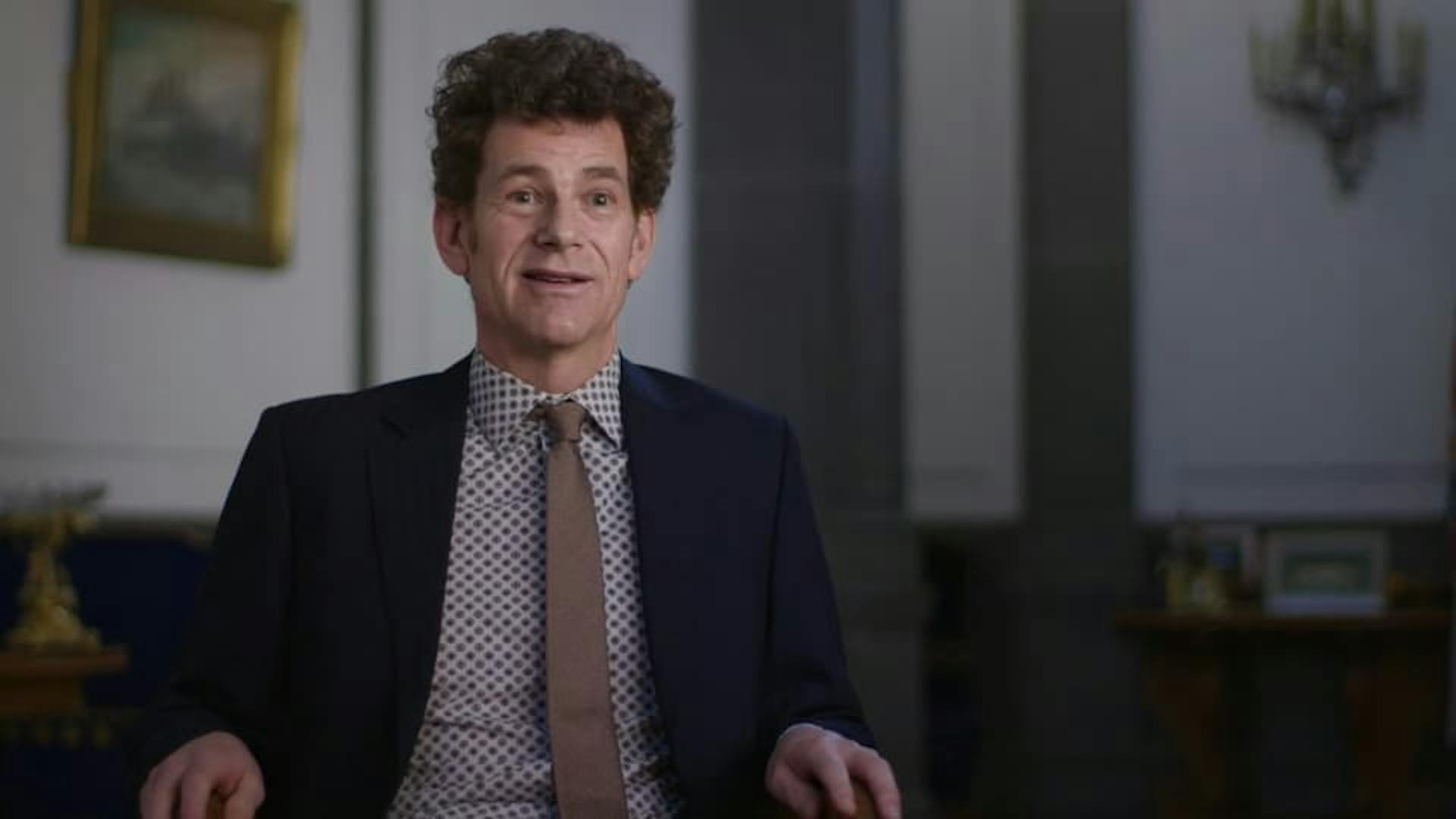 Man being interviewed