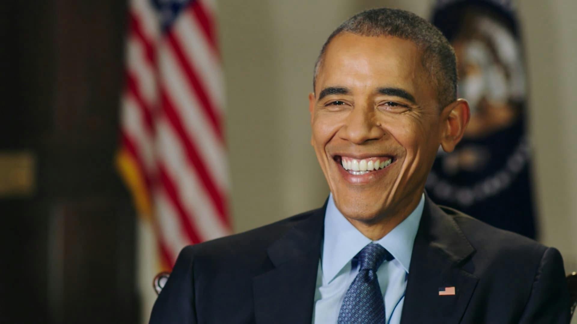 Barack Obama smiling at camera