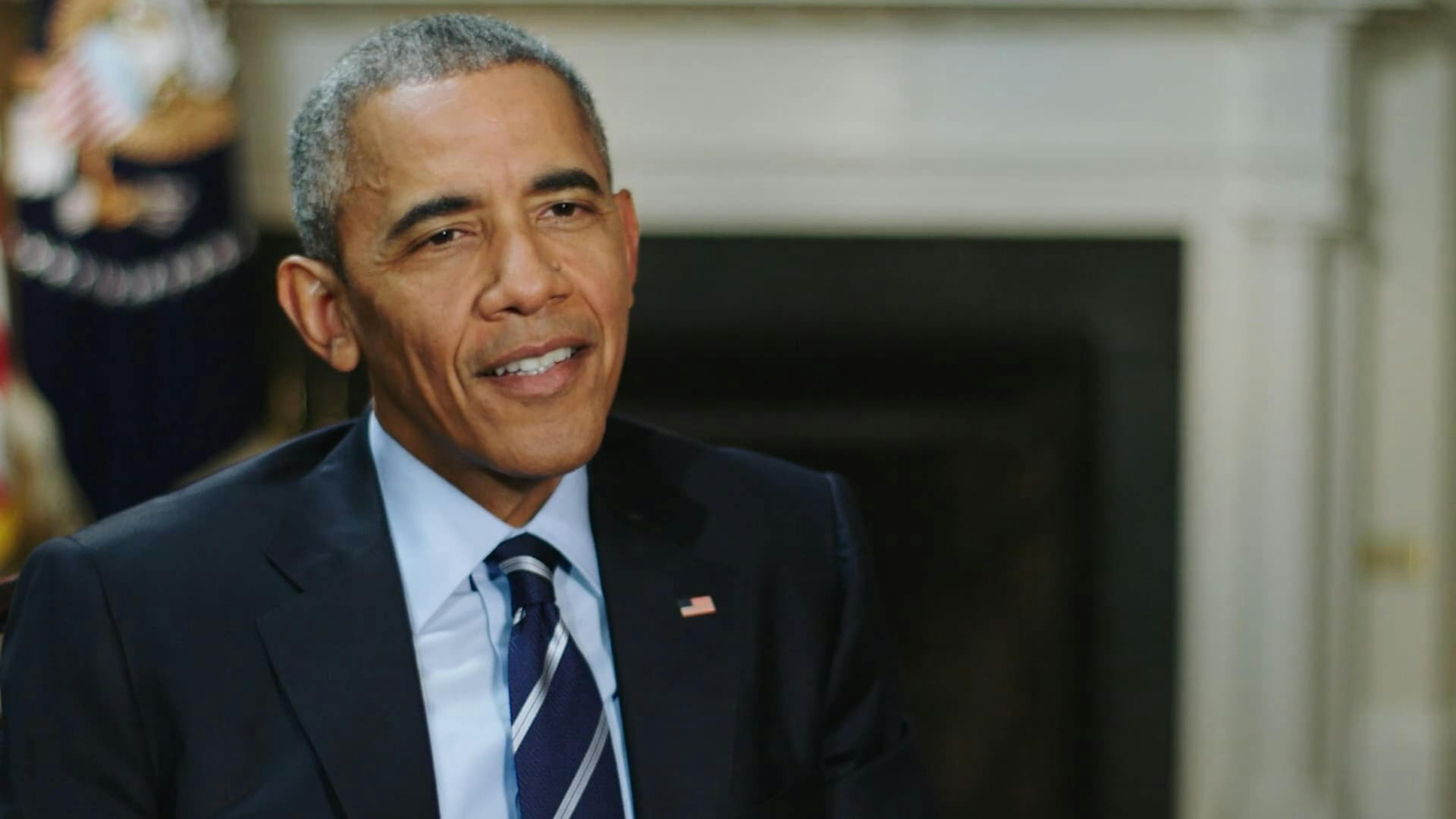 Barack Obama smiling at camera