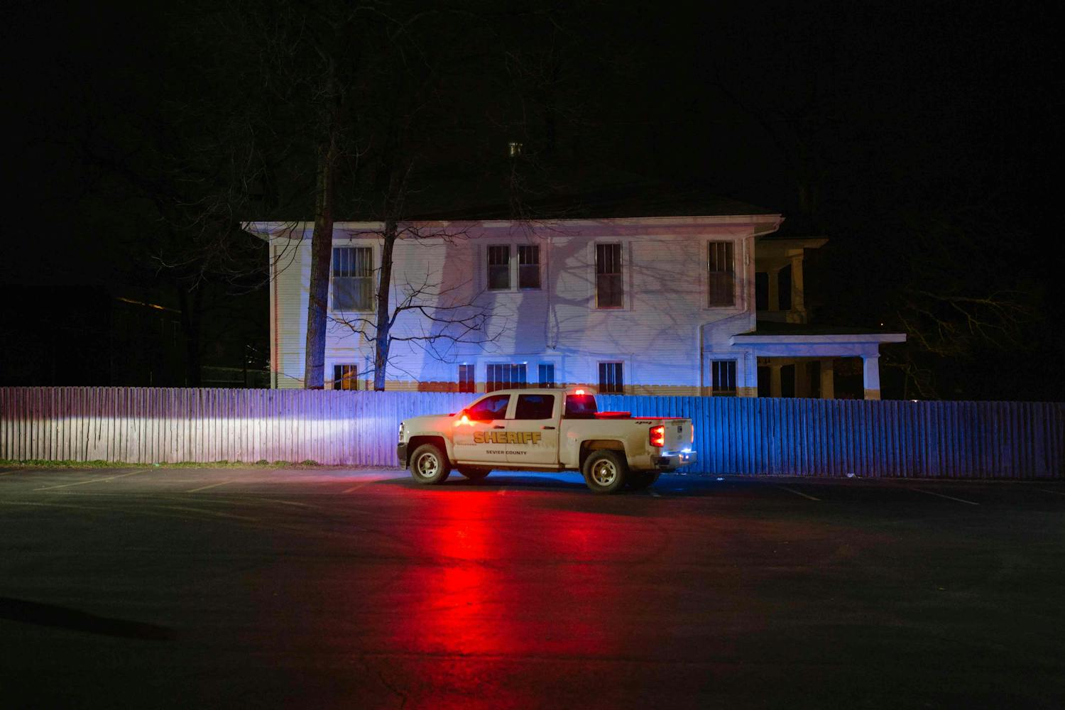 Sheriff car outside house