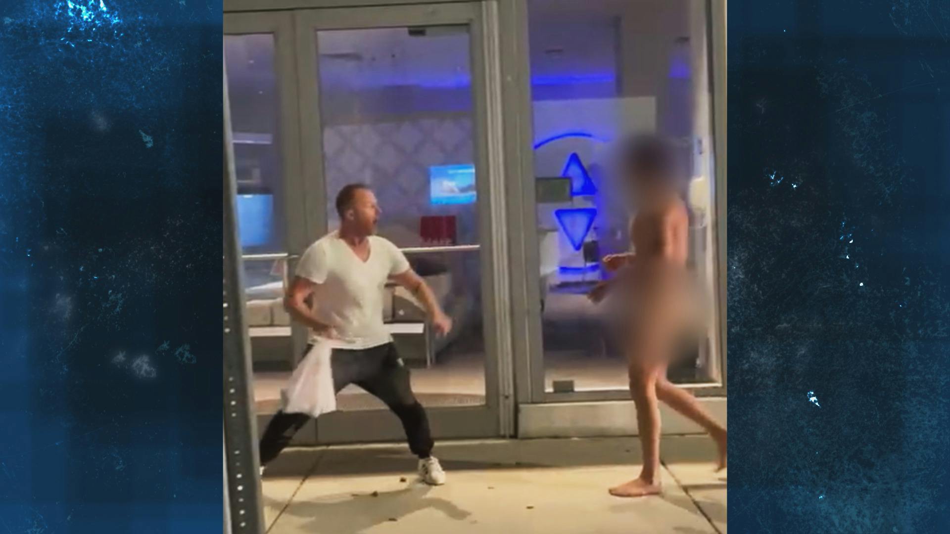 Man fighting naked man