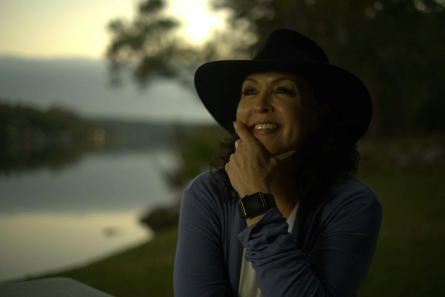 Woman wearing hat smiling