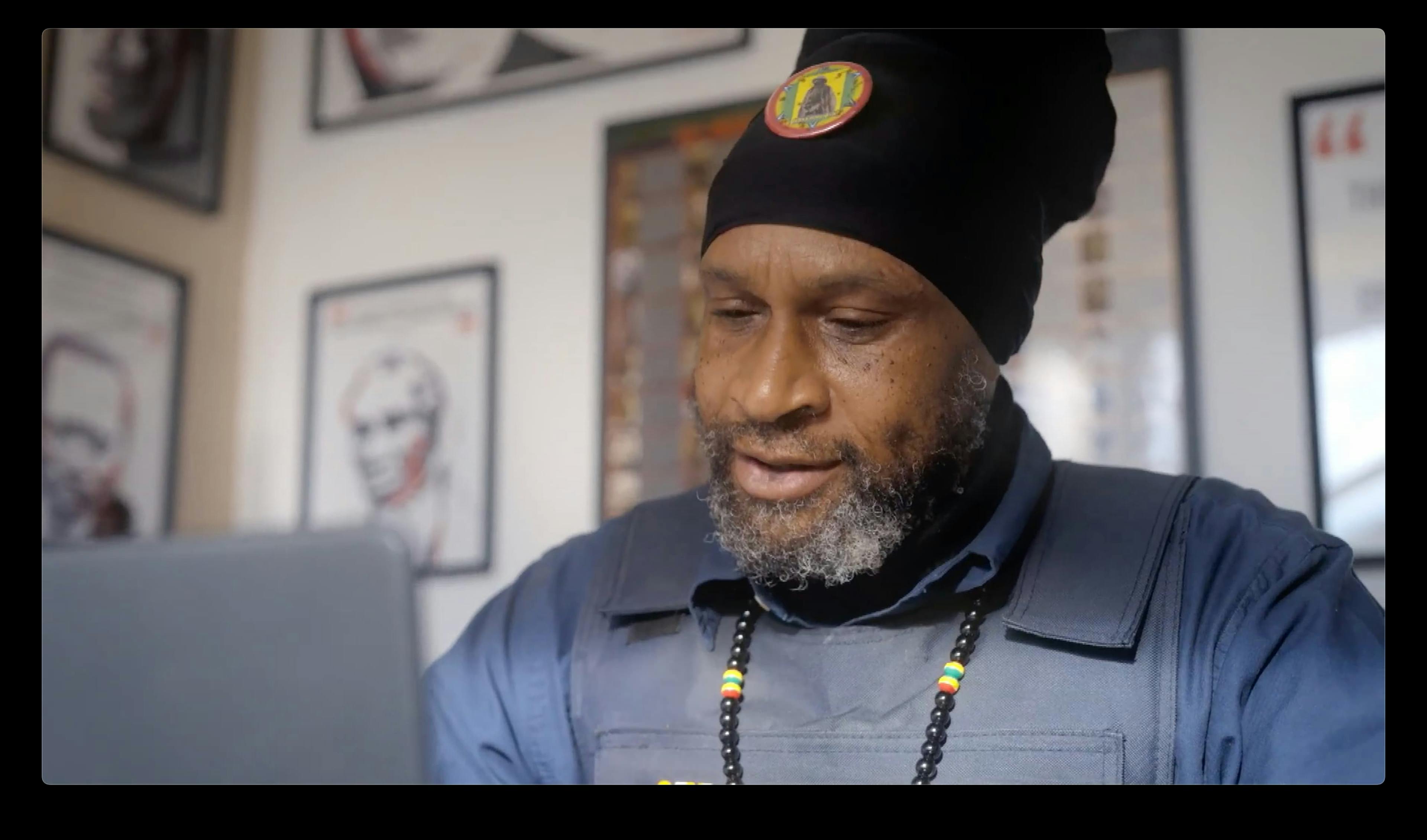 Man sat in front of laptop