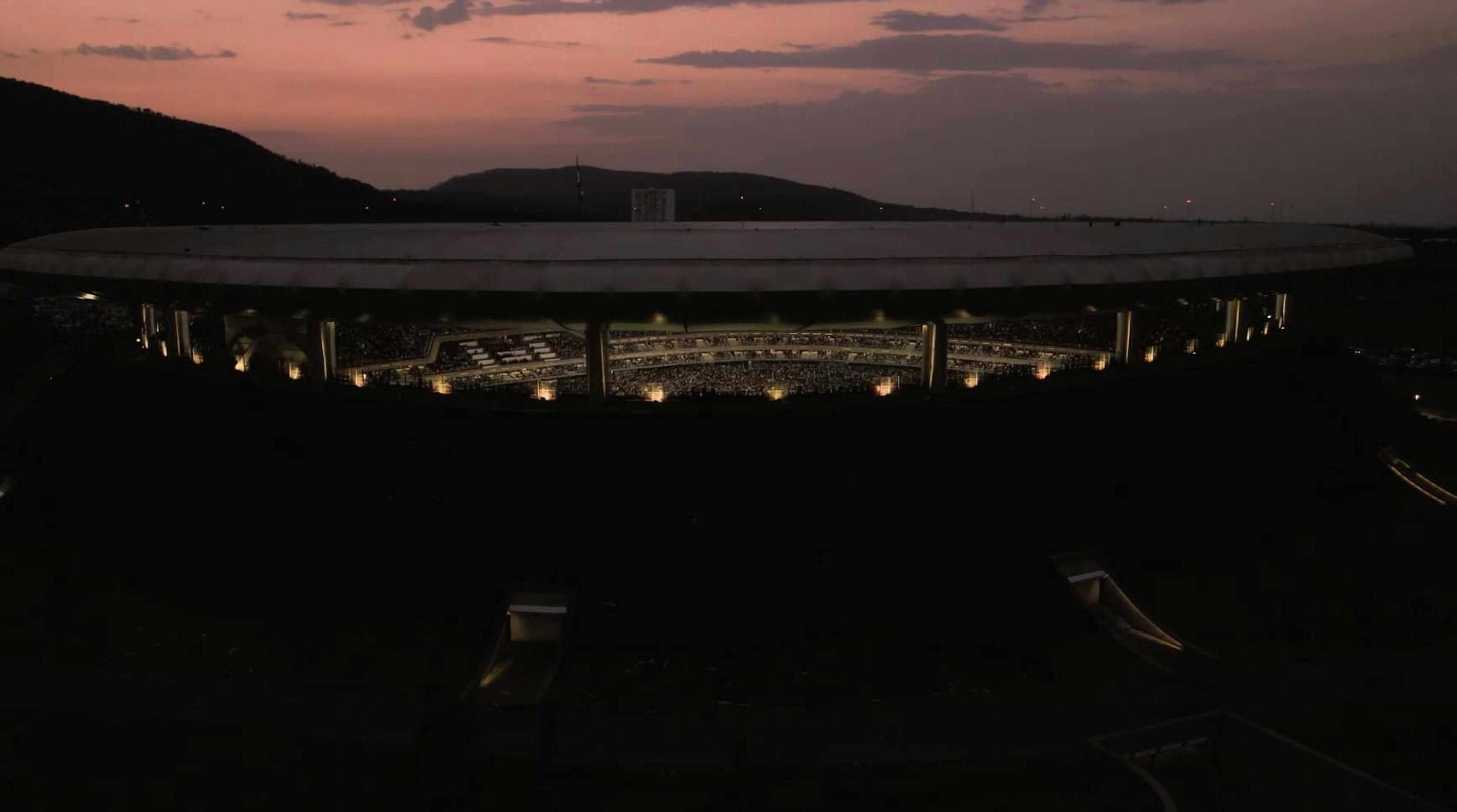Outside shot of stadium with fans in it
