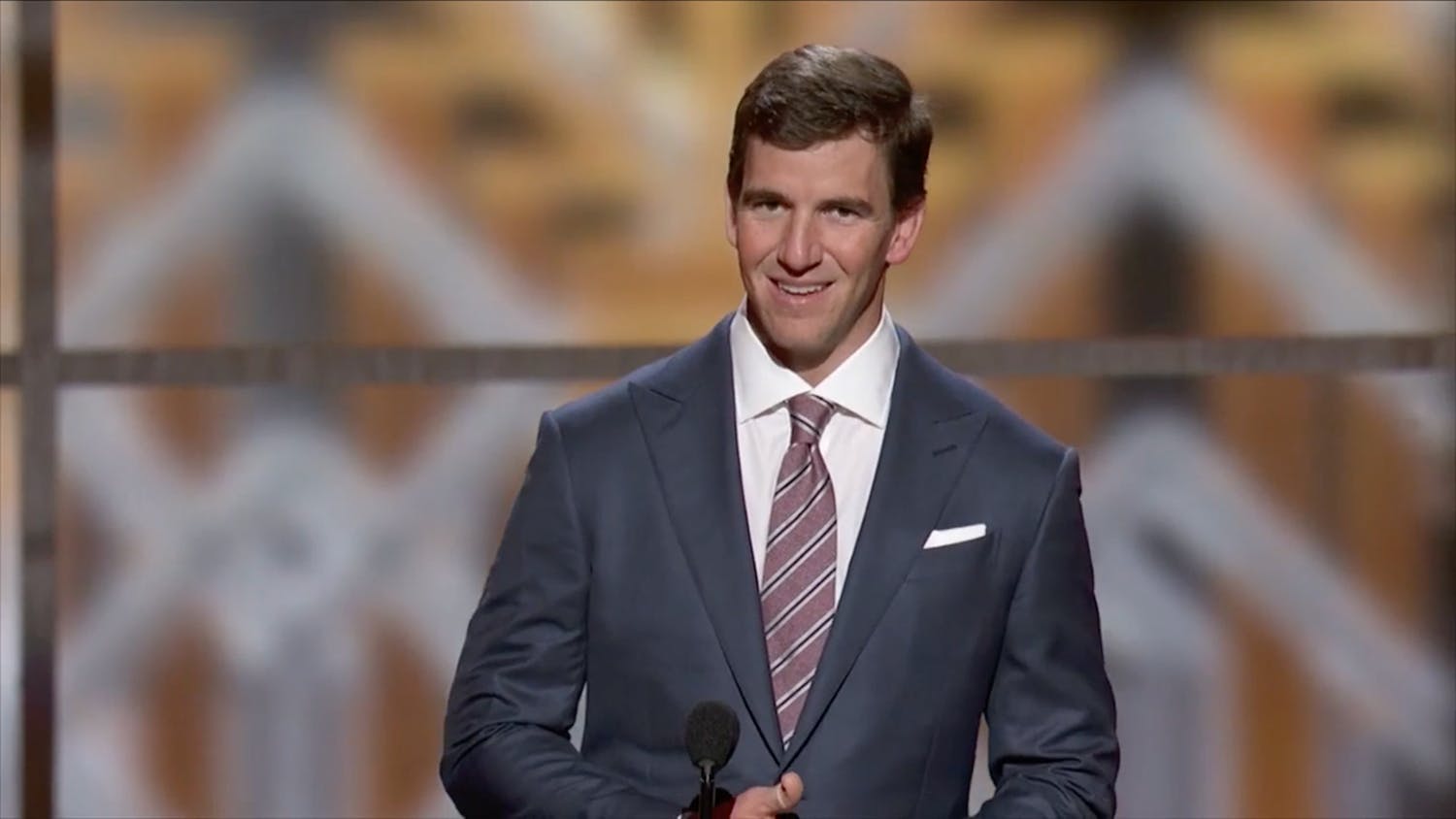 Man presenting award