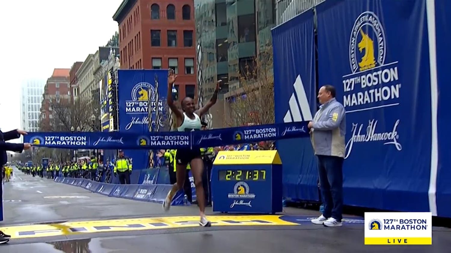 First person crossing finish line of Boston Marathon