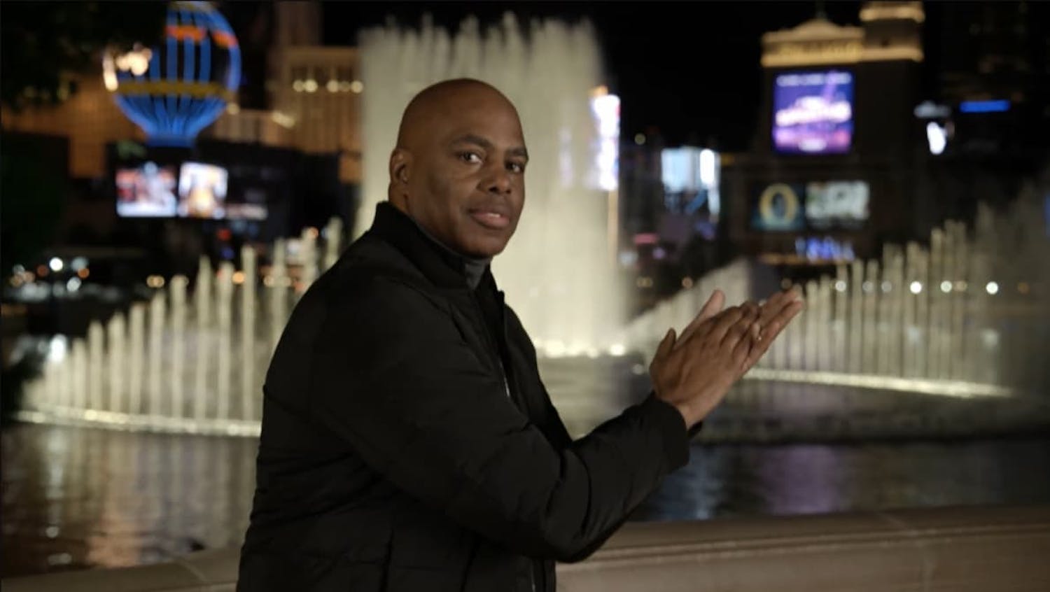 Man stood next to the fountains in Vegas