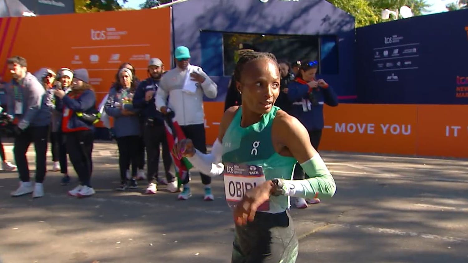 Woman looking behind during run