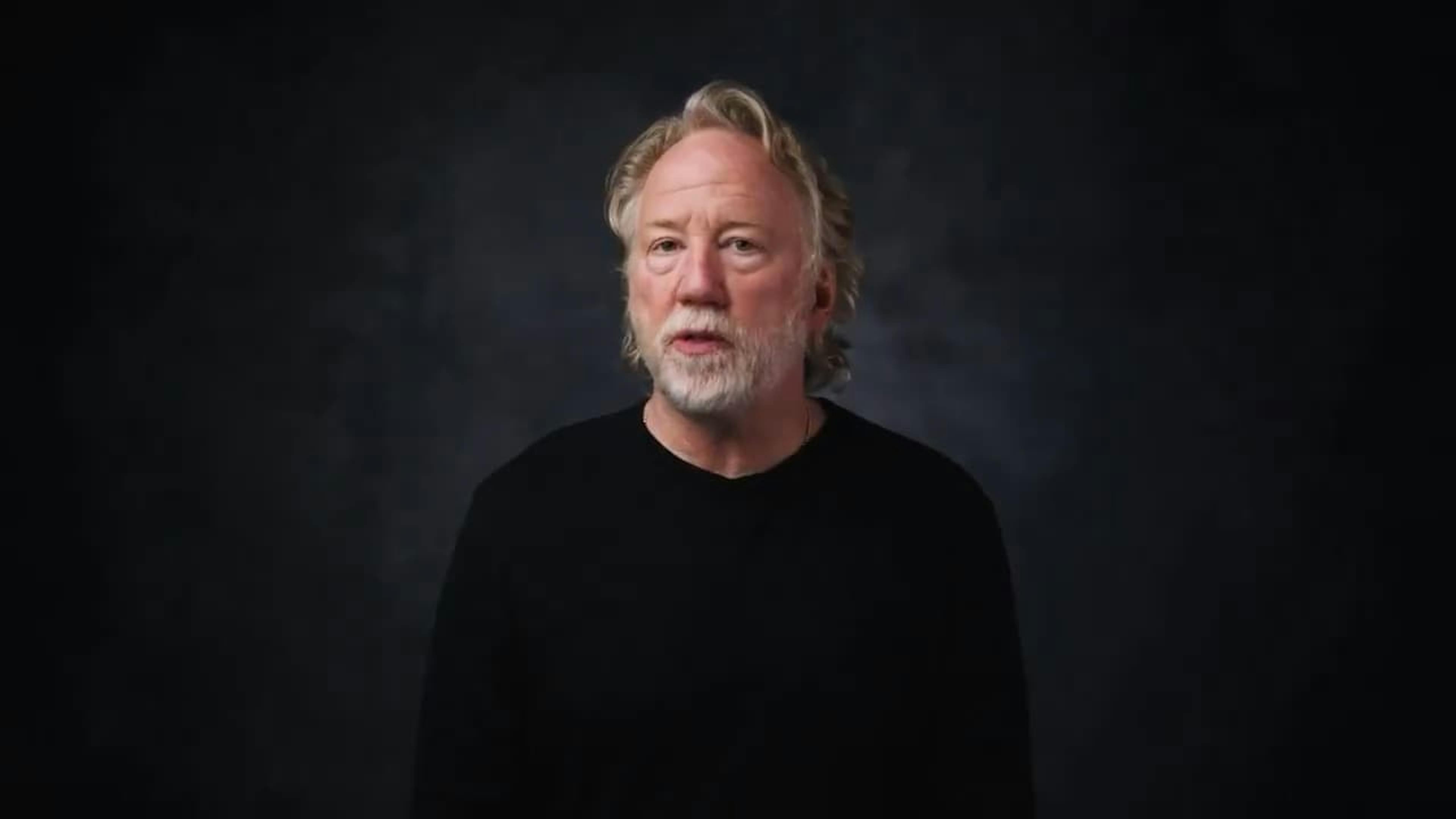 Man being interviewed