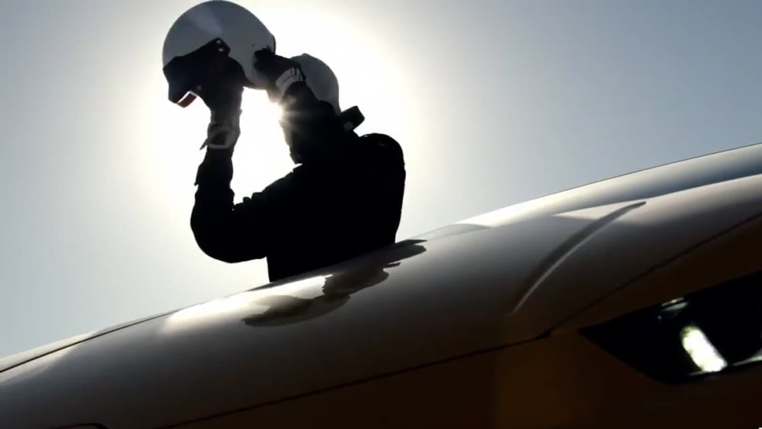 Man taking off helmet