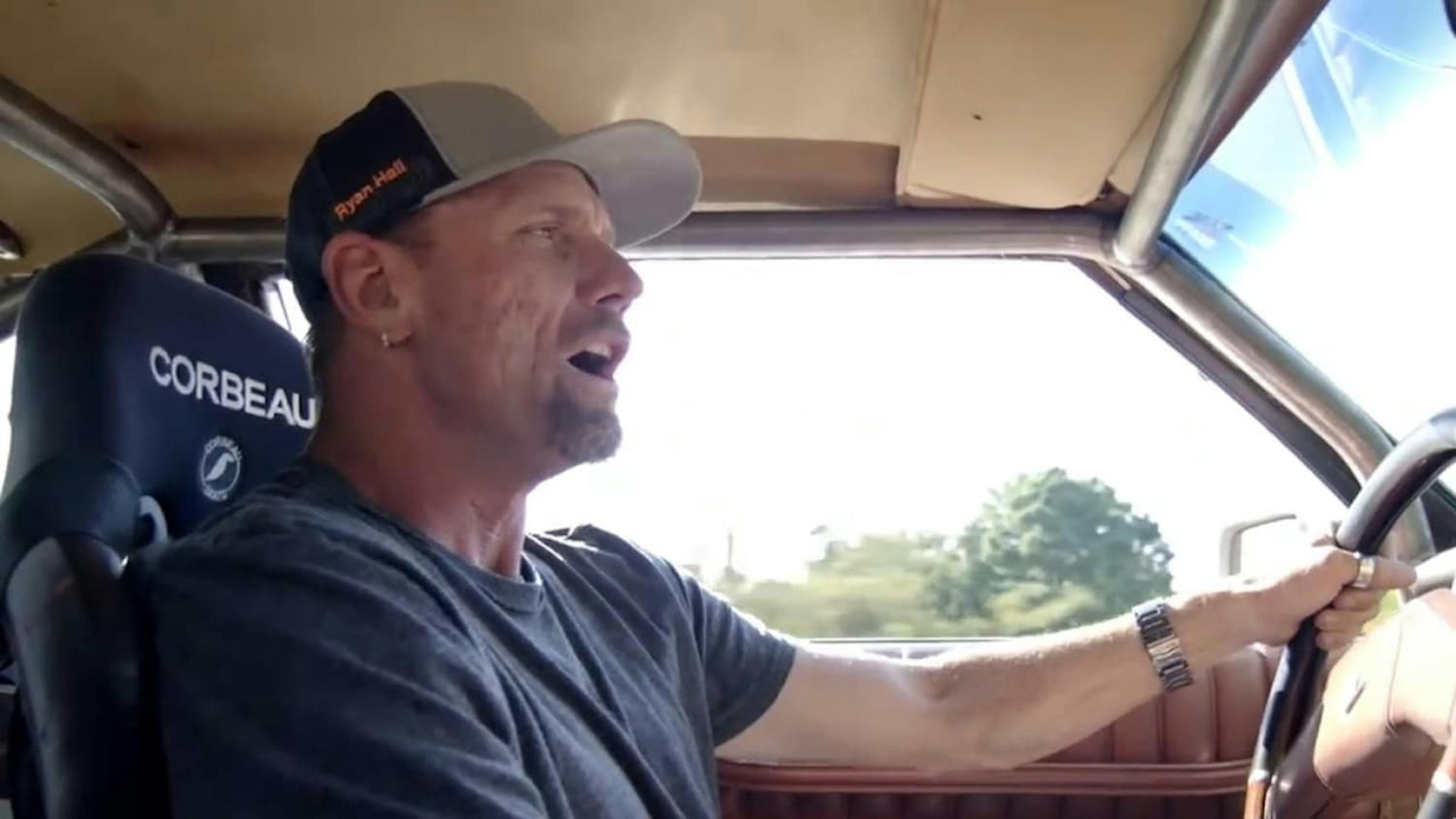 Inside shot of man driving car