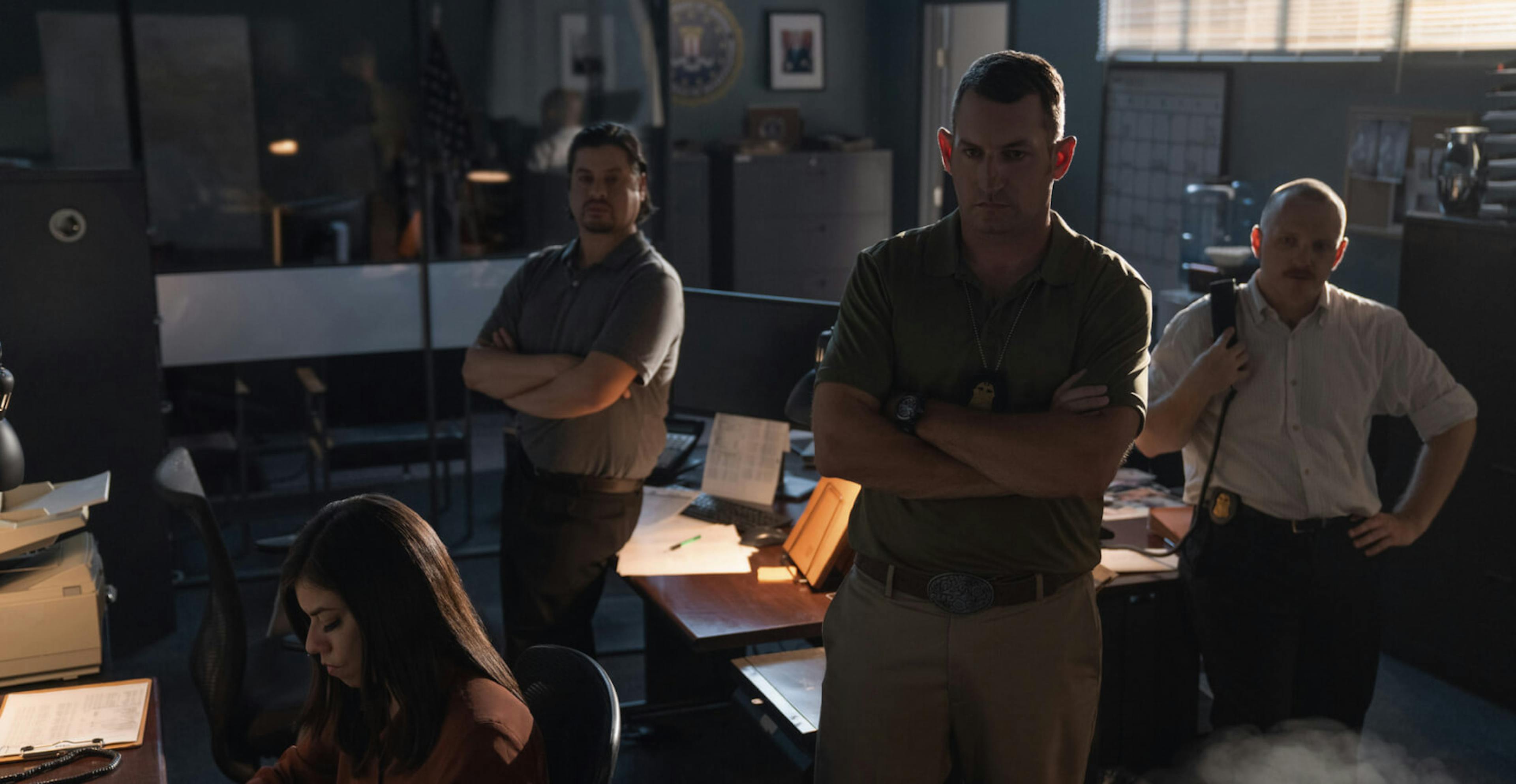 Multiple police officers in an office