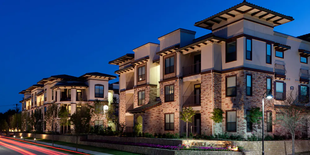 Apartment building photo of AMLI at Escena in Irving, TX