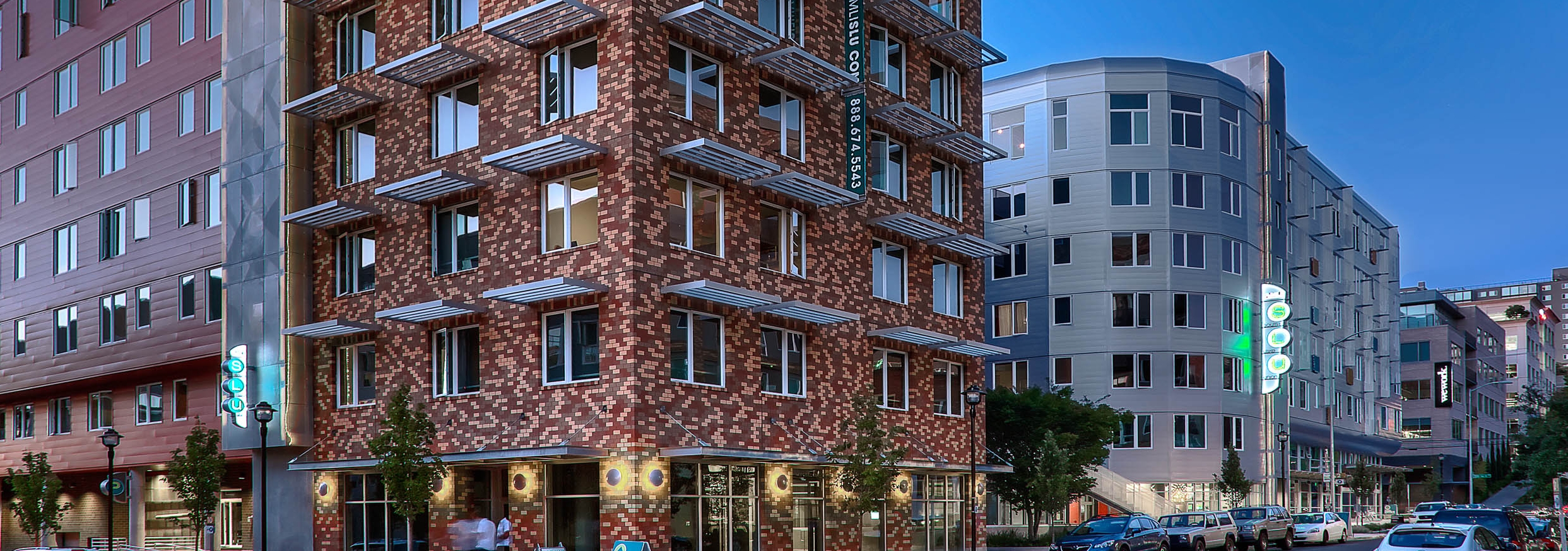 Exterior view of AMLI South Lake Union apartment facade at the intersection of Pontius Avenue North and Republican Street.