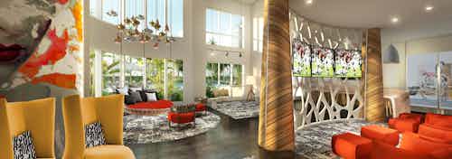Clubroom with ceiling to floor windows at AMLI Park West with modern eclectic yellow and orange furniture and TVs