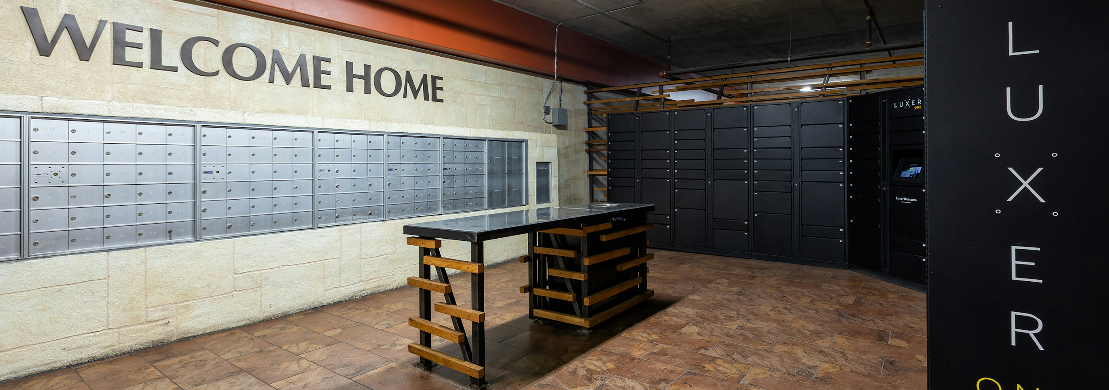 Interior view of AMLI 300 Luxer Mail-room with individual lockers and individual mail boxes for each apartment home