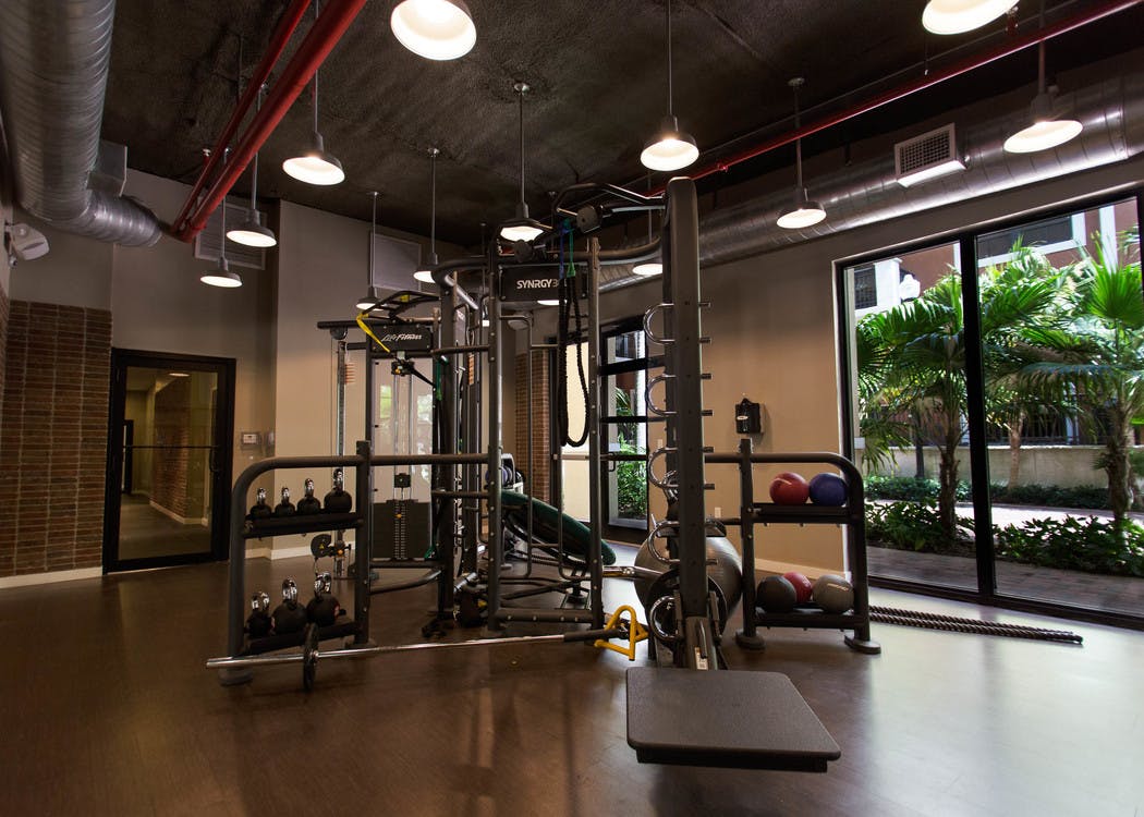 Two Story Fitness Center at AMLI Dadeland equipped with treadmills and high endurance