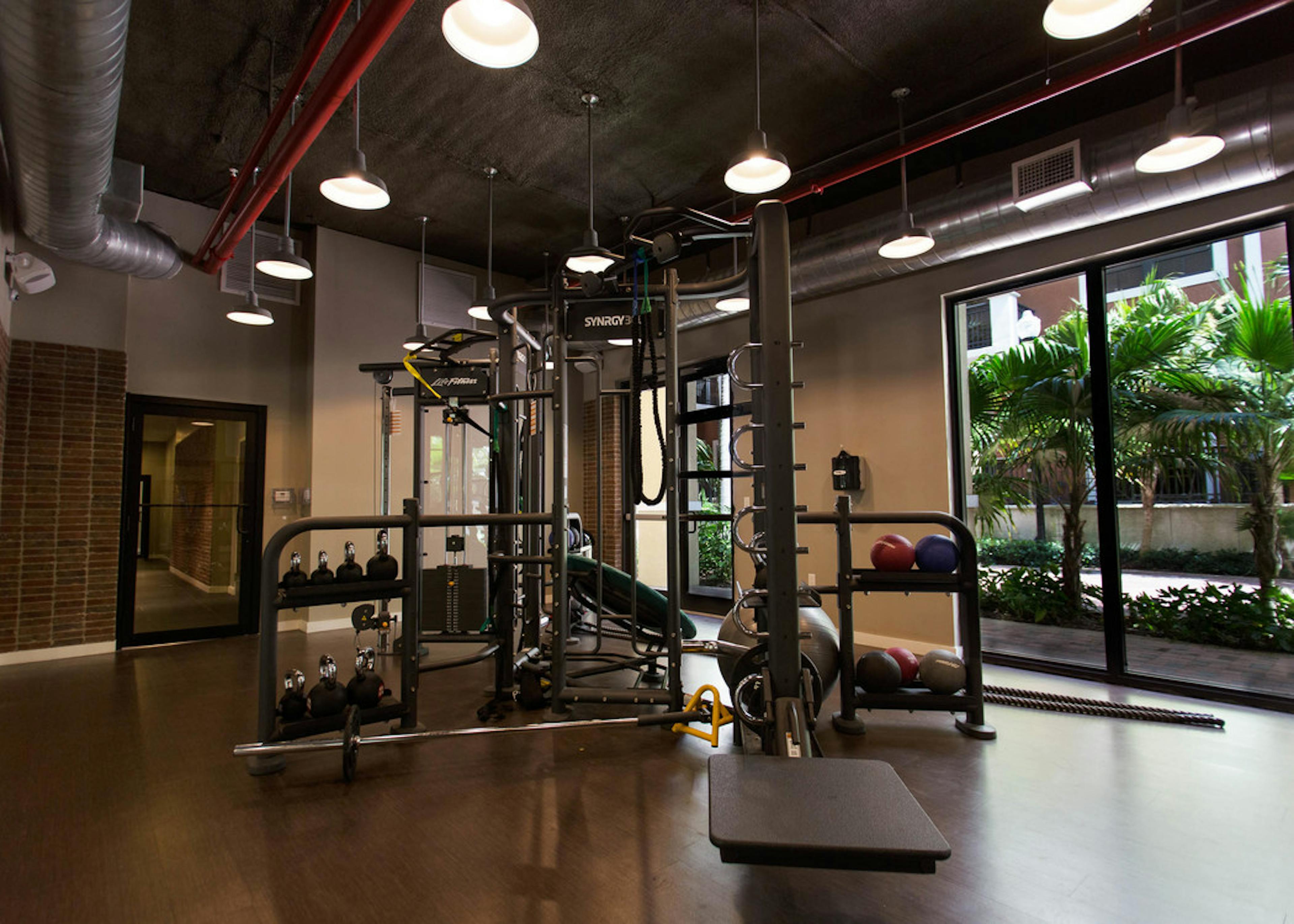 Two Story Fitness Center at AMLI Dadeland equipped with treadmills and high endurance 
